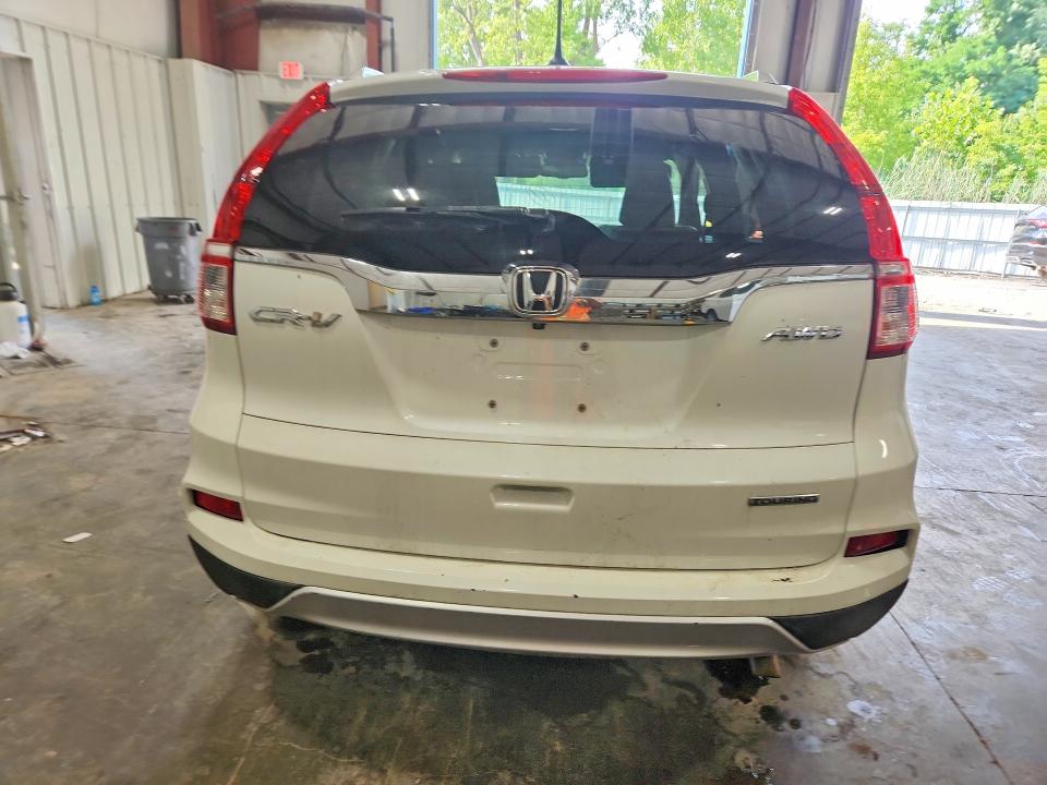 Photo 6 from auction – 2016 HONDA CR-V with VIN 5J6RM4H95GL047632