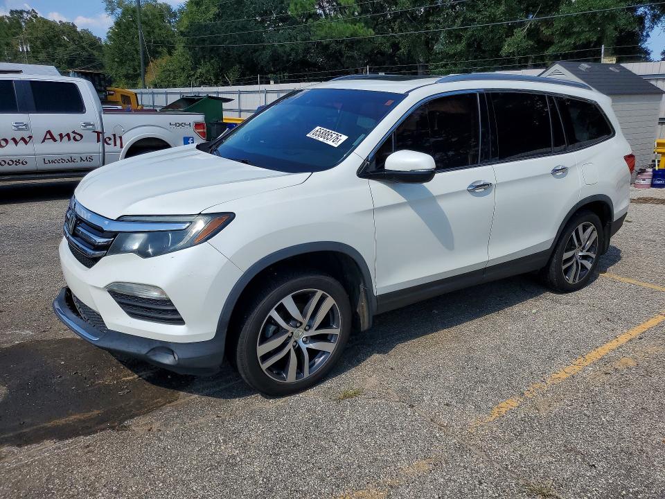 HONDA PILOT 2018 with VIN 5FNYF5H98JB007959 - Photo from auction