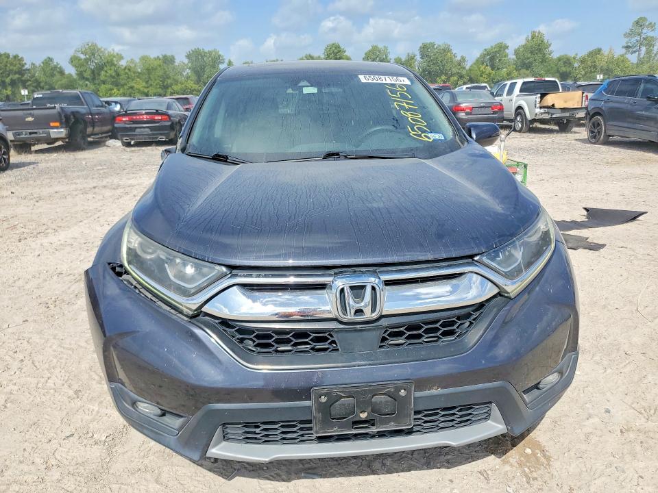 Photo 5 from auction – 2017 HONDA CR-V with VIN 5J6RW1H82HL010863
