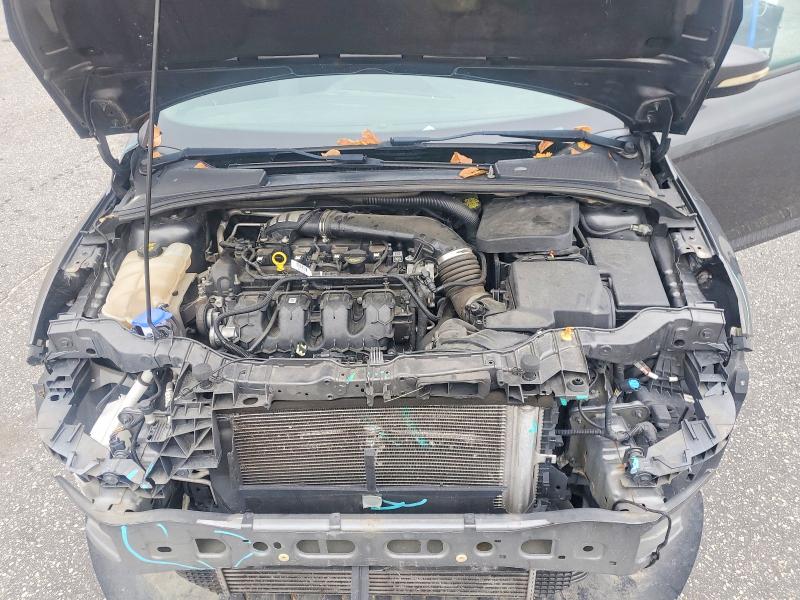 Снимка 11 от търг – 2016 FORD FOCUS с VIN 1FADP3L95GL350506