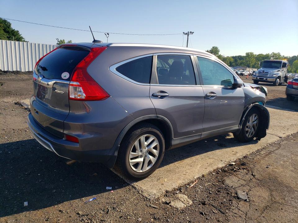 Photo 3 from auction – 2016 HONDA CR-V with VIN 5J6RM4H71GL057637