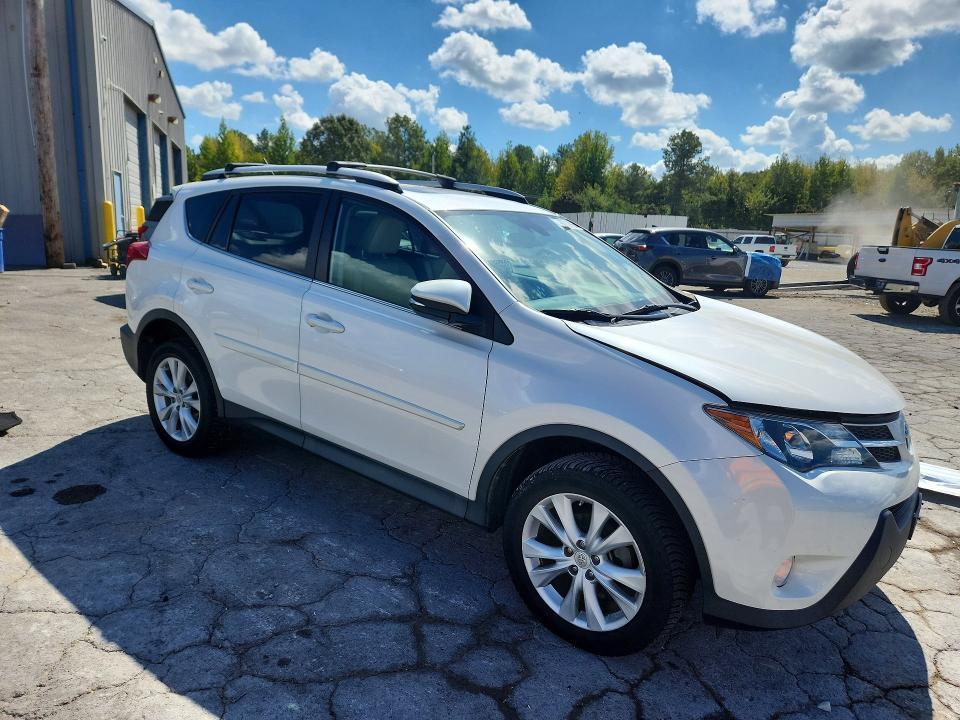 Photo 4 from auction – 2014 TOYOTA RAV4 with VIN 2T3DFREV3EW207140