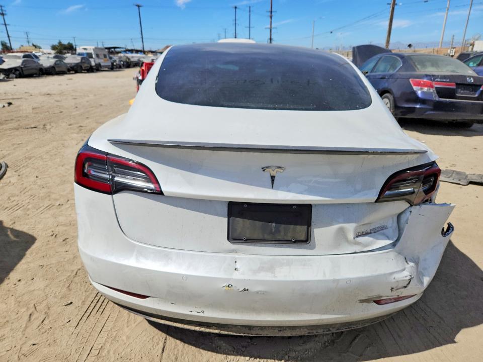 Photo 6 from auction – 2021 TESLA MODEL 3 with VIN 5YJ3E1EC1MF935929