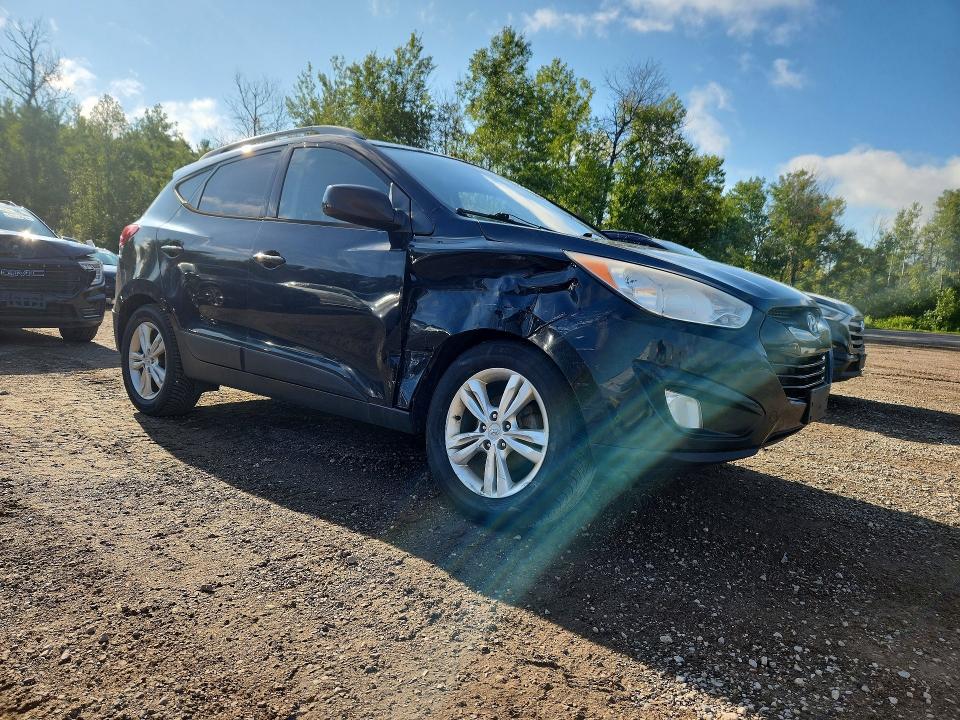 Photo 4 from auction – 2011 HYUNDAI TUCSON with VIN KM8JU3AC2BU314050
