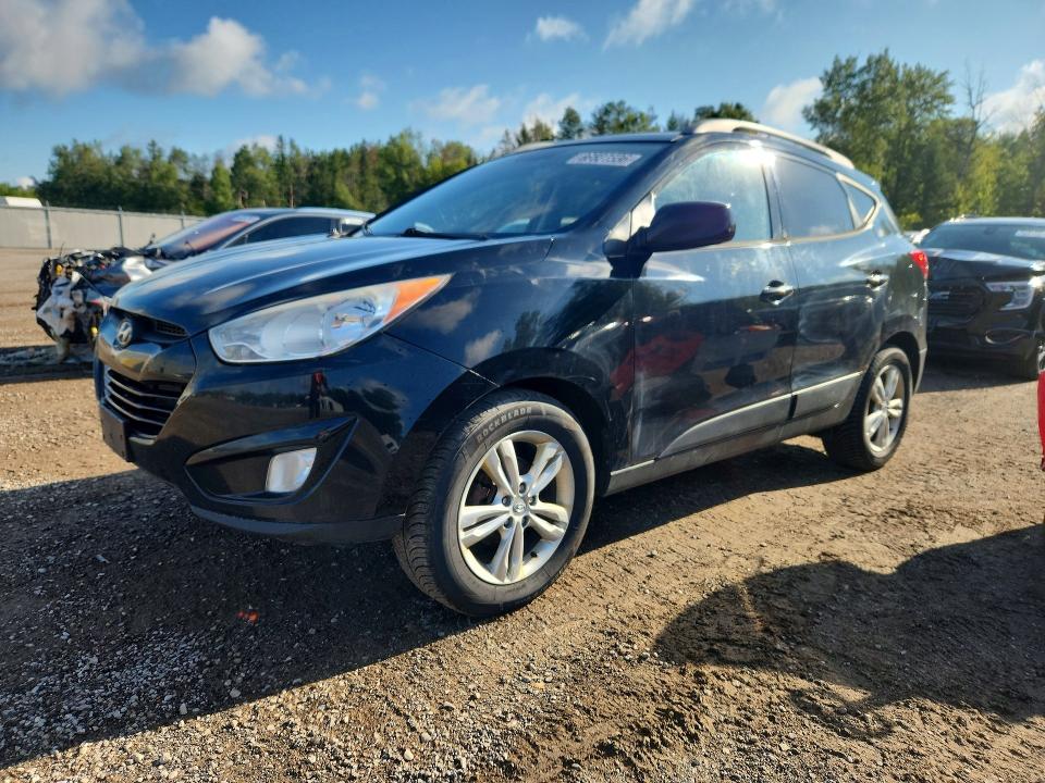 HYUNDAI TUCSON 2011 with VIN KM8JU3AC2BU314050 - Photo from auction