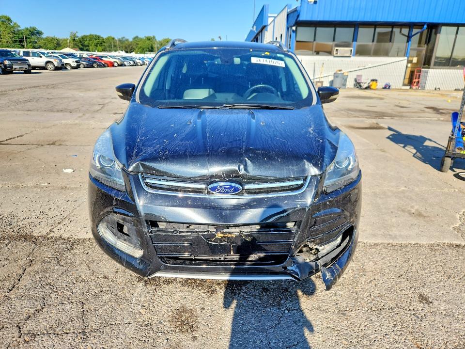 Снимка 5 от търг – 2014 FORD ESCAPE с VIN 1FMCU0JX8EUD71464