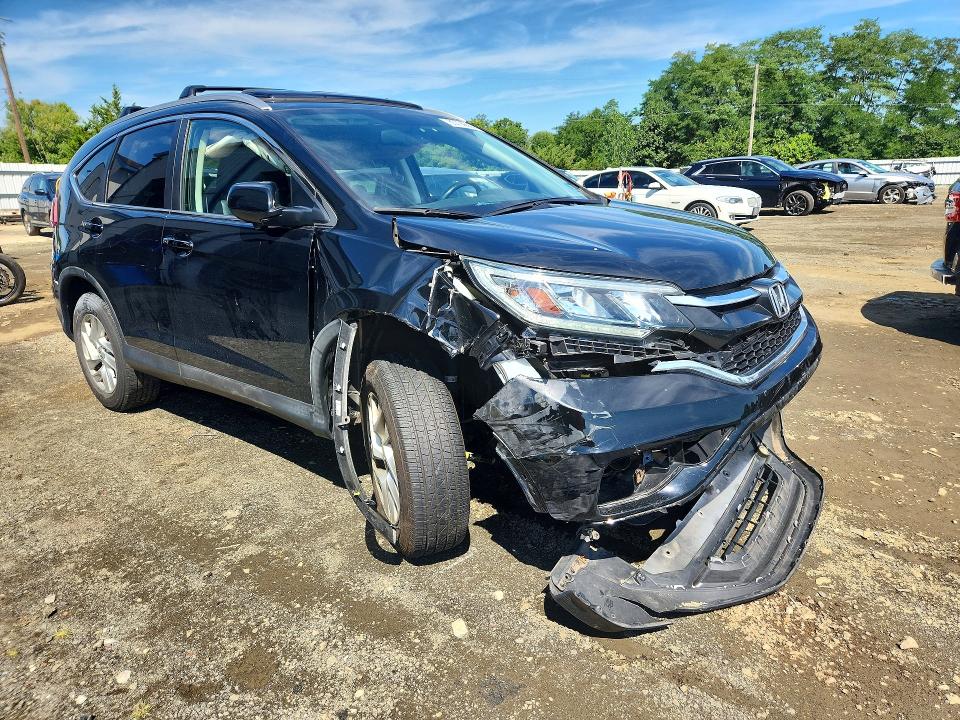 Photo 4 from auction – 2016 HONDA CR-V with VIN 5J6RM4H74GL055395