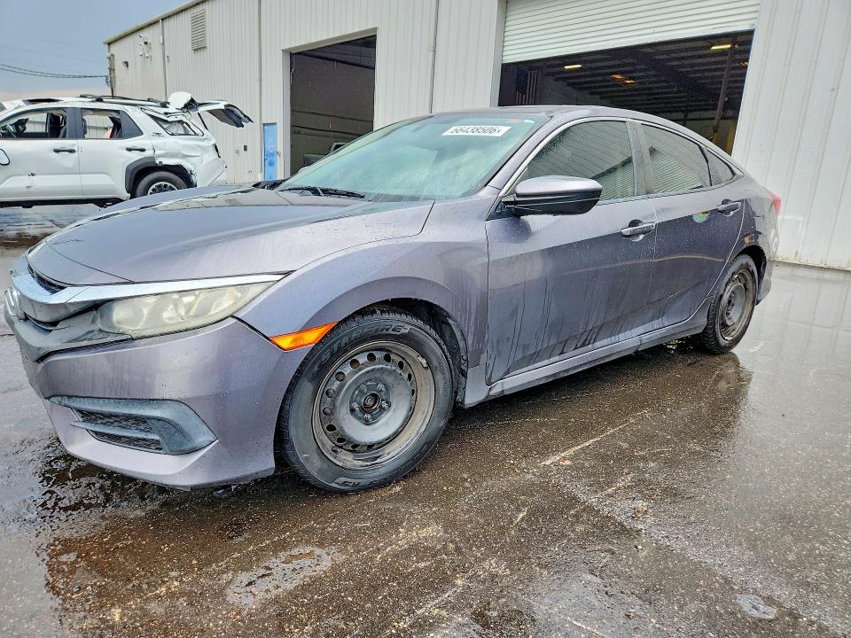 HONDA CIVIC 2017 with VIN 19XFC2F5XHE036118 - Photo from auction