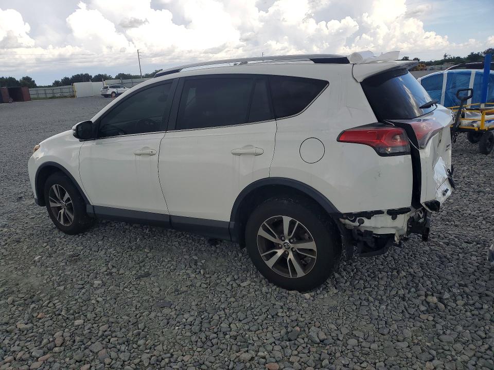 Photo 2 from auction – 2016 TOYOTA RAV4 with VIN JTMRFREV7GJ090234