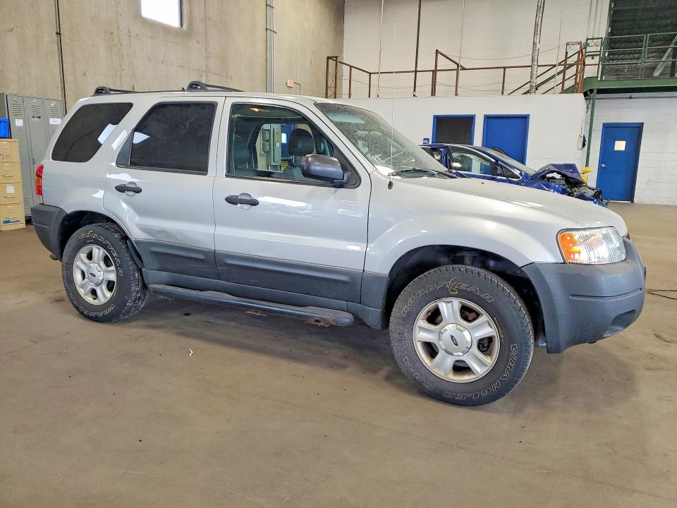 Photo 4 from auction – 2003 FORD ESCAPE with VIN 1FMYU93183KB12338