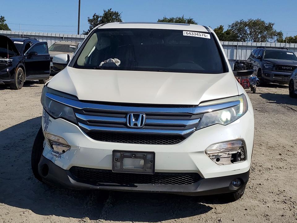 Photo 5 from auction – 2016 HONDA PILOT with VIN 5FNYF5H57GB028520