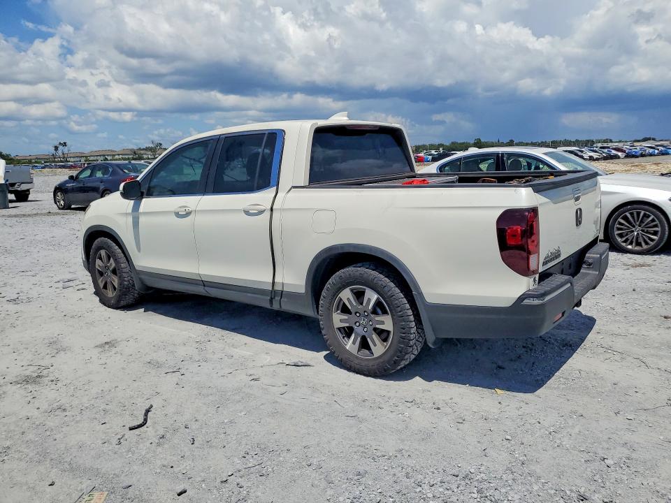 Photo 2 from auction – 2017 HONDA RIDGELINE with VIN 5FPYK2F65HB001797