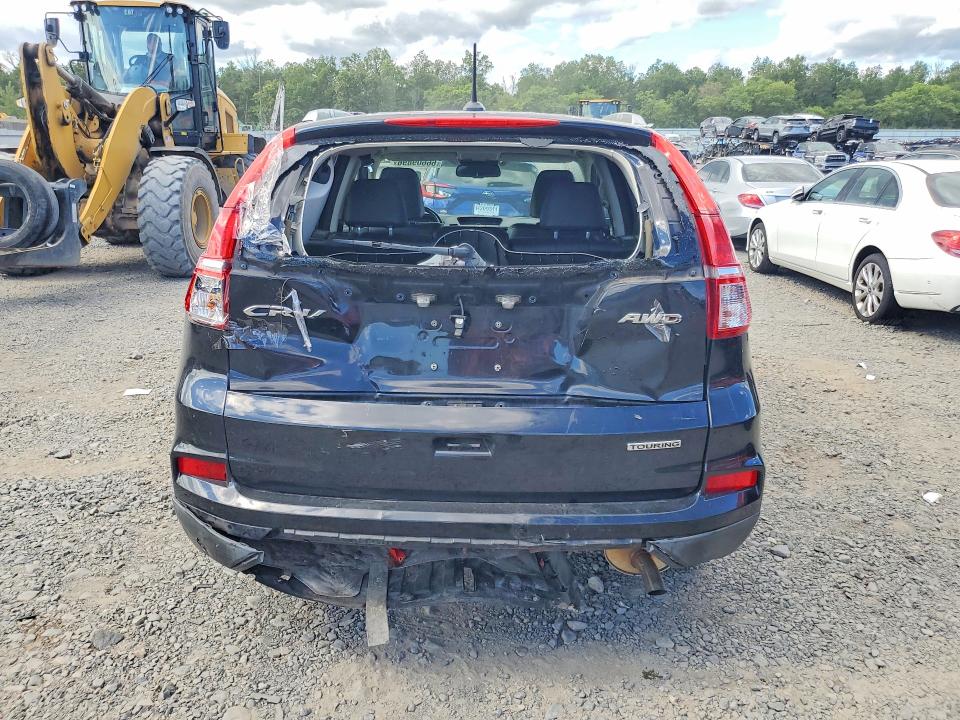 Photo 6 from auction – 2015 HONDA CR-V with VIN 5J6RM4H90FL093304