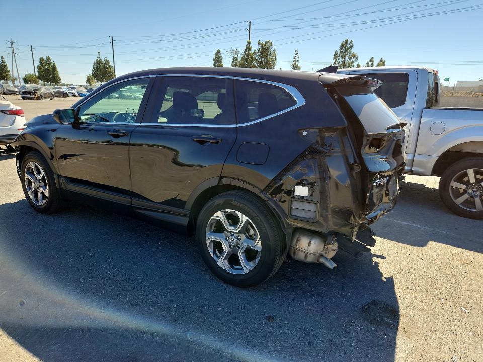 Photo 2 from auction – 2019 HONDA CR-V with VIN 7FARW1H52KE025129