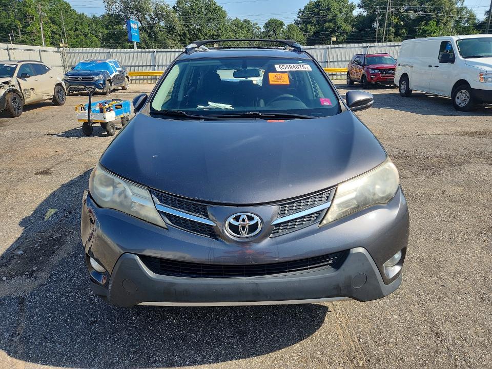 Photo 5 from auction – 2014 TOYOTA RAV4 with VIN JTMWFREV2EJ006949