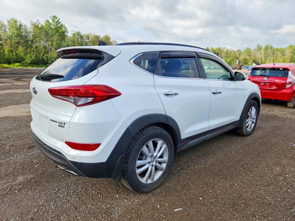 Photo 3 from auction – 2016 HYUNDAI TUCSON with VIN KM8J3CA21GU036761