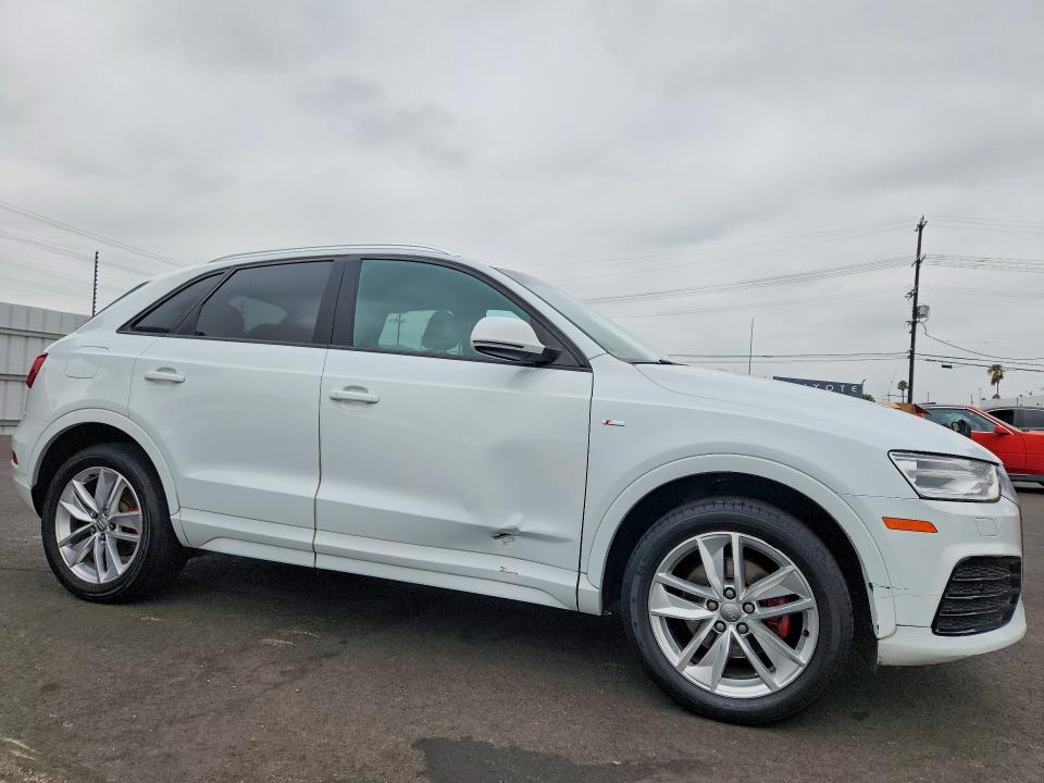 Photo 4 from auction – 2018 AUDI Q3 with VIN WA1BCCFSXJR023433
