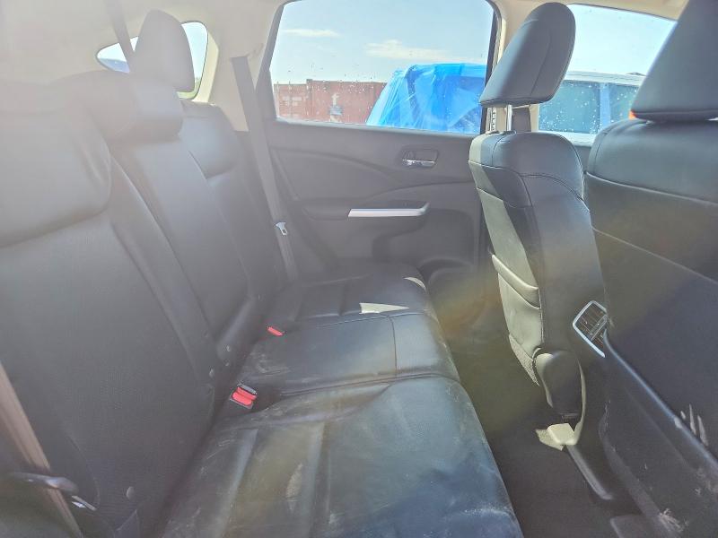 Photo 11 from auction – 2015 HONDA CR-V with VIN 2HKRM3H78FH522062