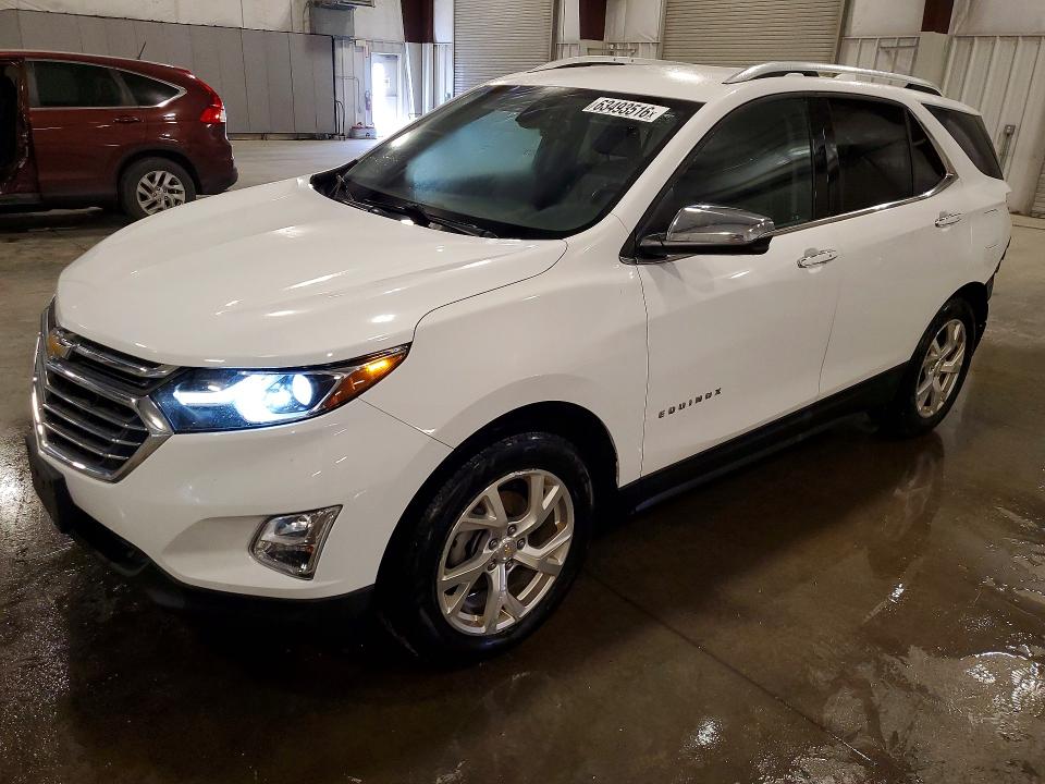 CHEVROLET EQUINOX 2018 with VIN 2GNAXVEV2J6290467 - Photo from auction