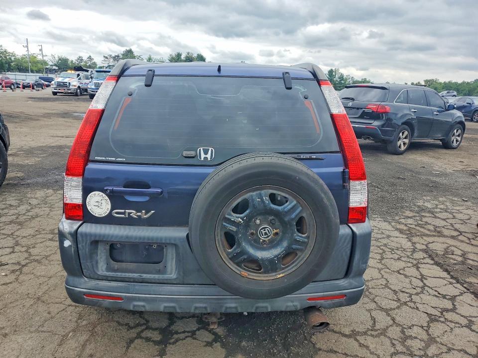 Photo 6 from auction – 2006 HONDA CR-V with VIN JHLRD78586C031107