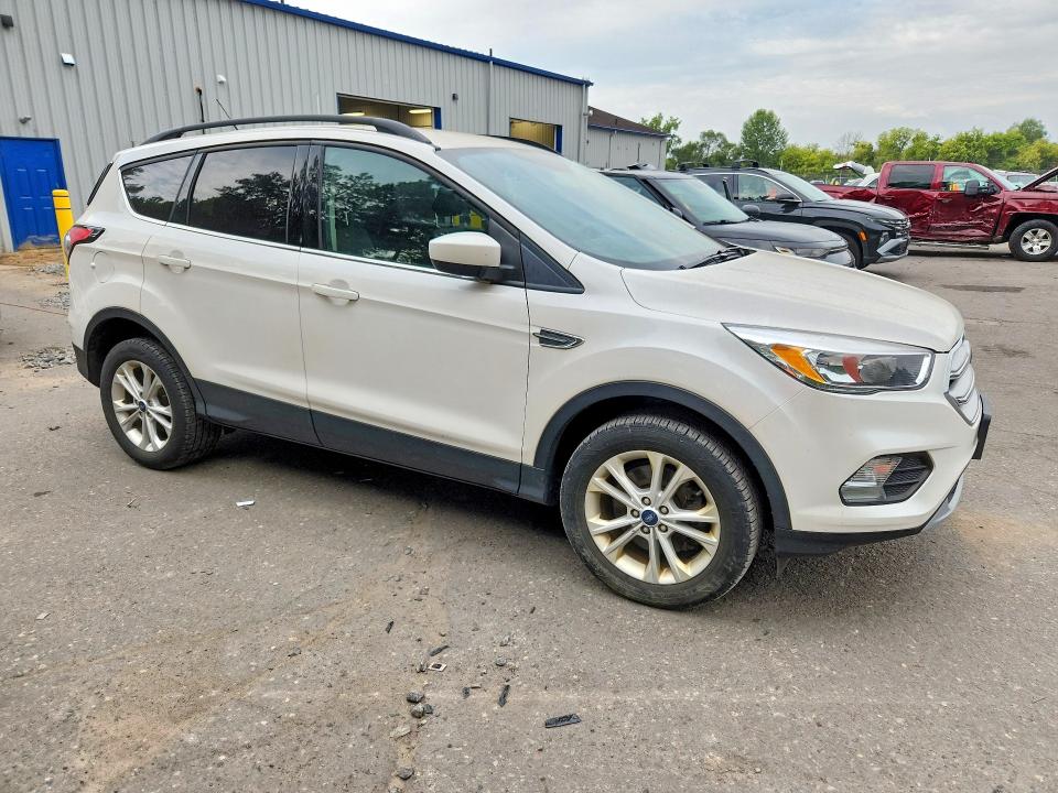 Photo 4 from auction – 2018 FORD ESCAPE with VIN 1FMCU9GD4JUD37212