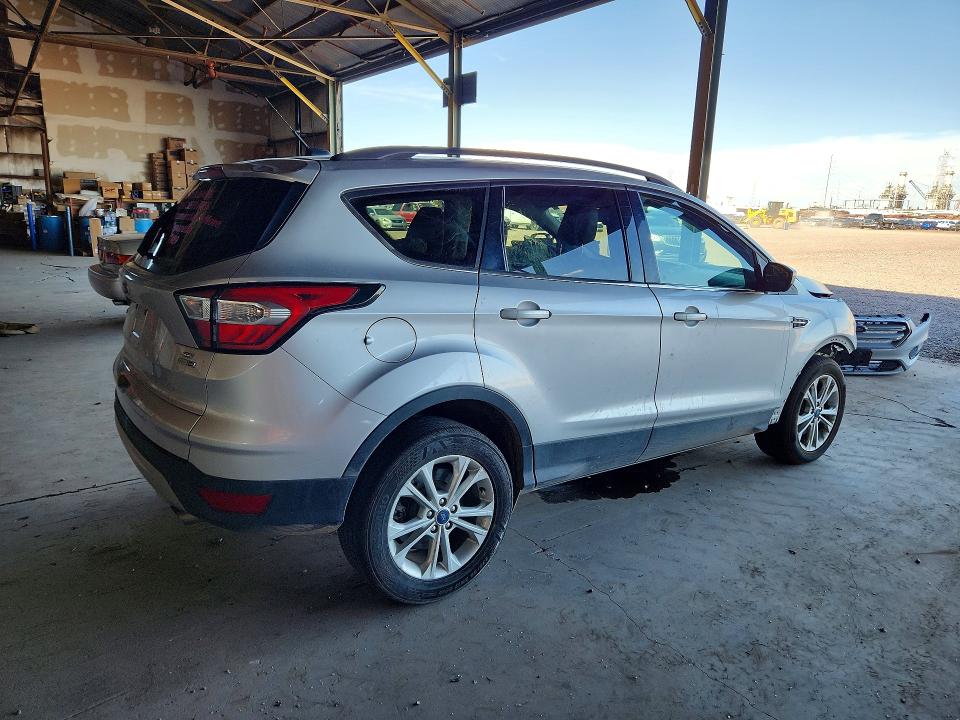 Photo 3 from auction – 2018 FORD ESCAPE with VIN 1FMCU9GD7JUD39116