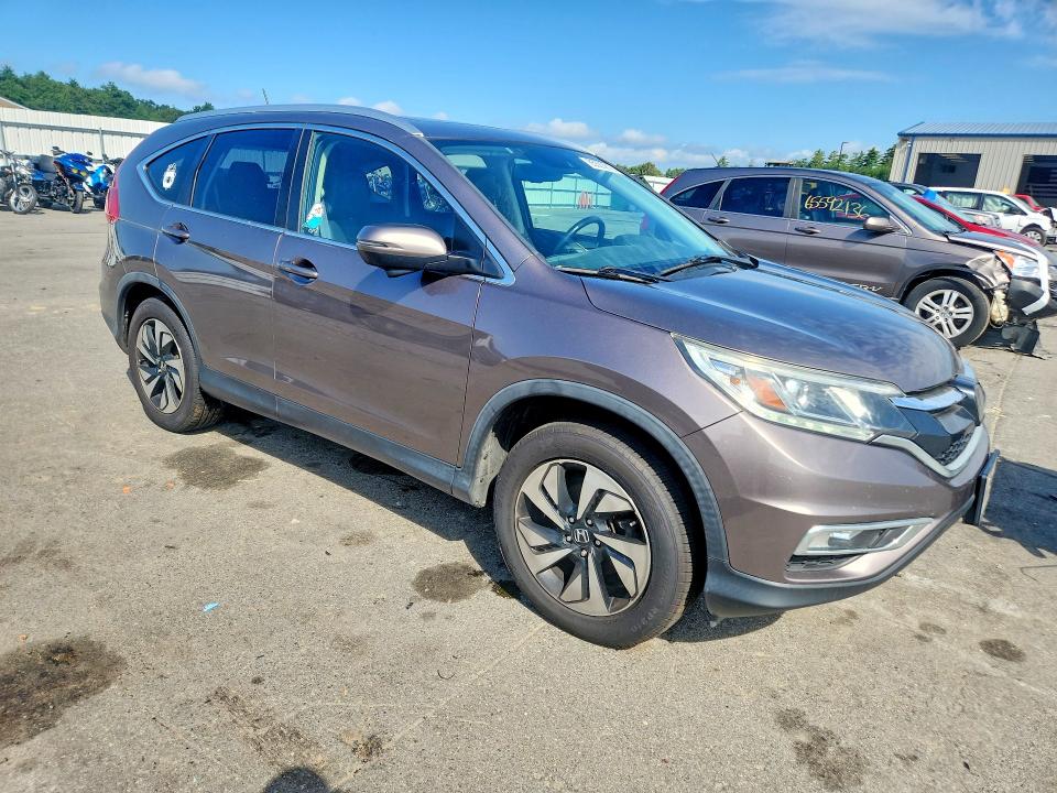 Photo 4 from auction – 2015 HONDA CR-V with VIN 5J6RM4H91FL090122