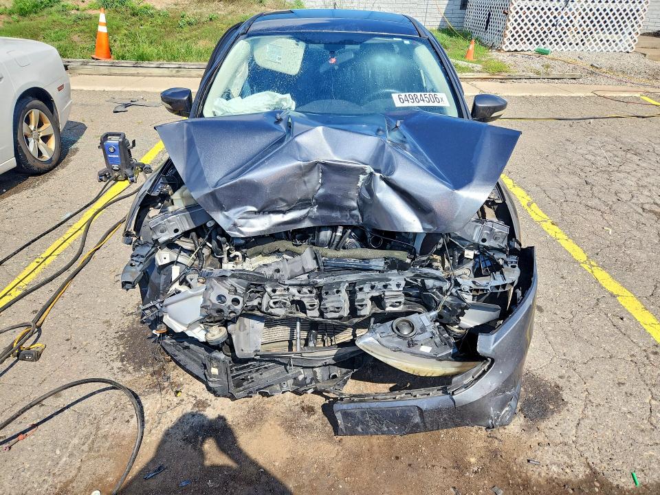 Photo 5 from auction – 2016 FORD FOCUS with VIN 1FADP3F24GL359437