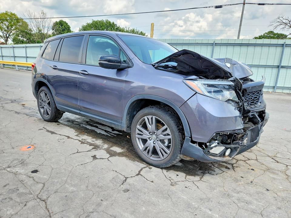 Photo 4 from auction – 2021 HONDA PASSPORT with VIN 5FNYF8H52MB001142