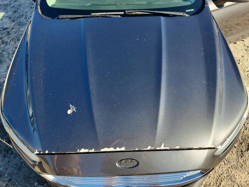 Photo 11 from auction – 2015 FORD FUSION with VIN 3FA6P0H73FR153252
