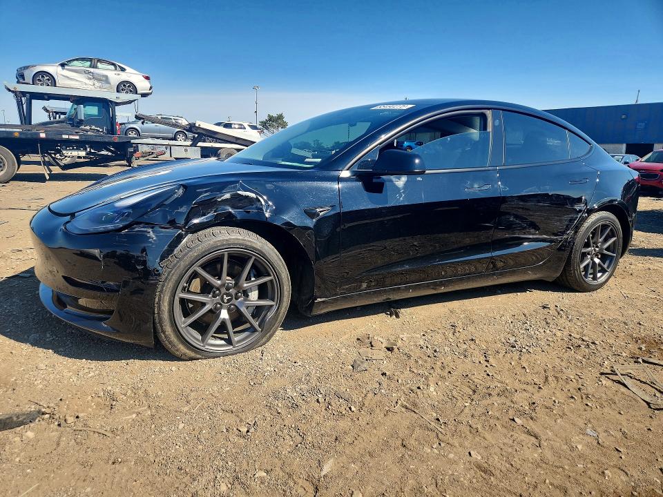 TESLA MODEL 3 2022 with VIN 5YJ3E1EB9NF119057 - Photo from auction