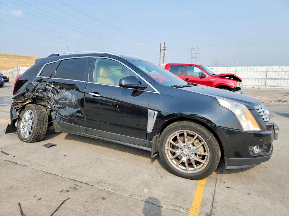 Photo 4 from auction – 2014 CADILLAC SRX with VIN 3GYFNGE30ES519406