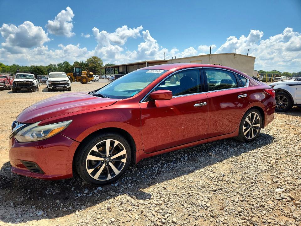 NISSAN ALTIMA 2016 с VIN 1N4AL3AP3GC117045 - Снимка от търг