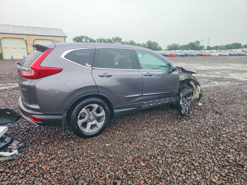 Photo 3 from auction – 2018 HONDA CR-V with VIN 7FARW2H87JE085177