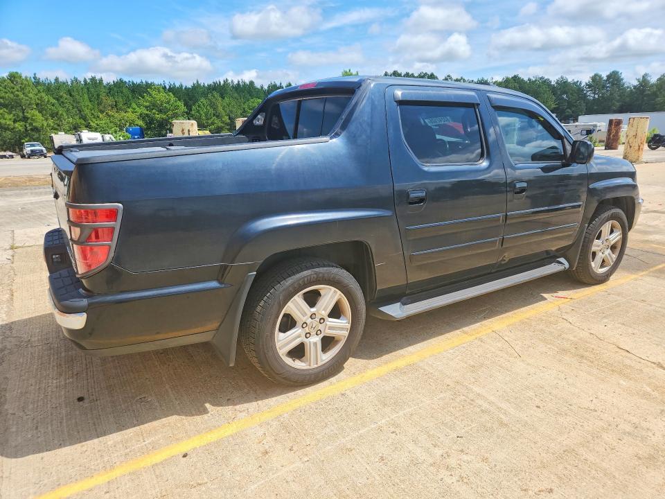 Photo 3 from auction – 2011 HONDA RIDGELINE with VIN 5FPYK1F50BB009847