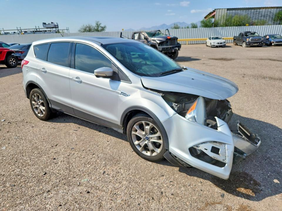 Photo 4 from auction – 2013 FORD ESCAPE with VIN 1FMCU9HX9DUA59162