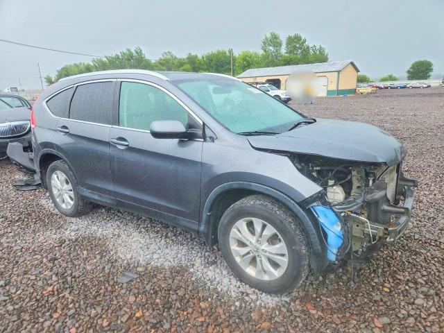 Photo 4 from auction – 2013 HONDA CR-V with VIN 2HKRM4H73DH636084