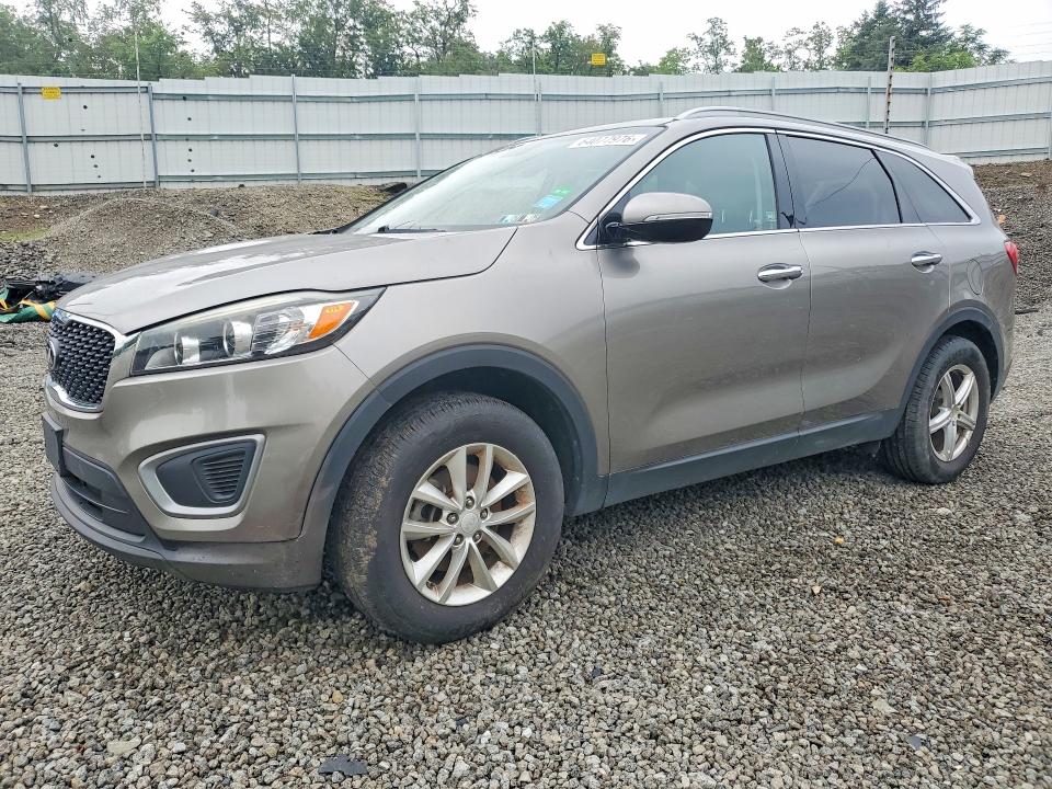 KIA SORENTO 2016 with VIN 5XYPG4A30GG052730 - Photo from auction