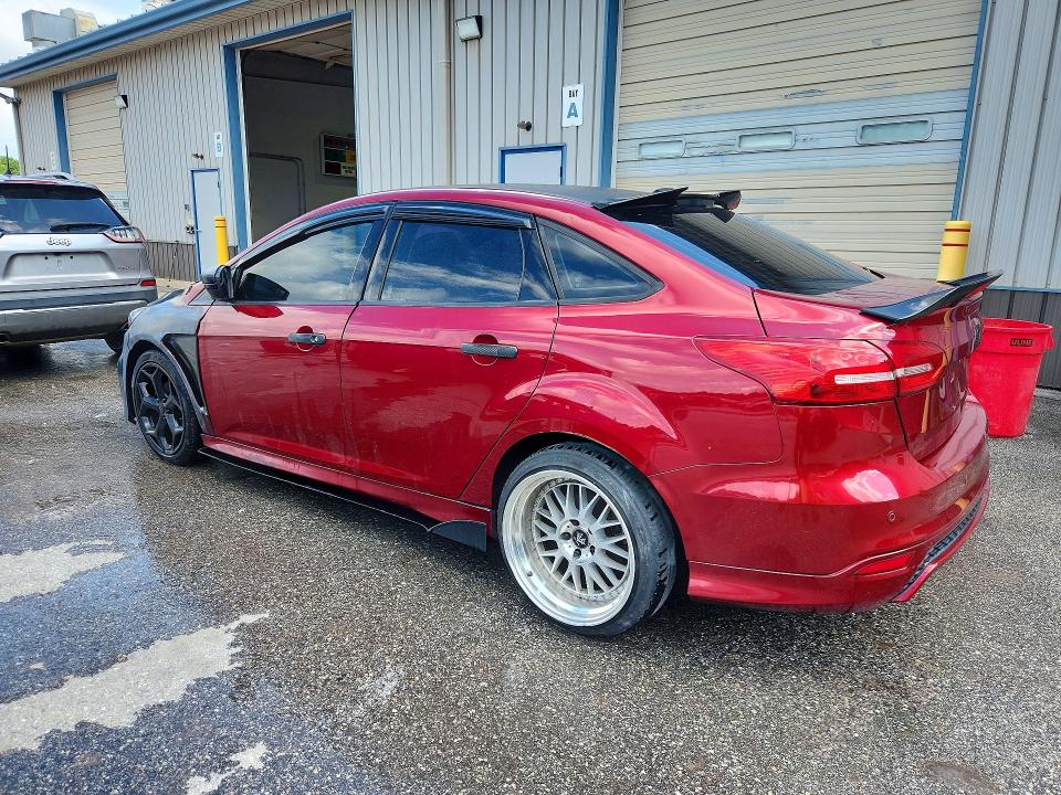 Photo 2 from auction – 2016 FORD FOCUS with VIN 1FADP3F2XGL343226