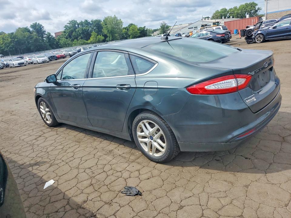 Photo 2 from auction – 2016 FORD FUSION with VIN 3FA6P0H79GR201709