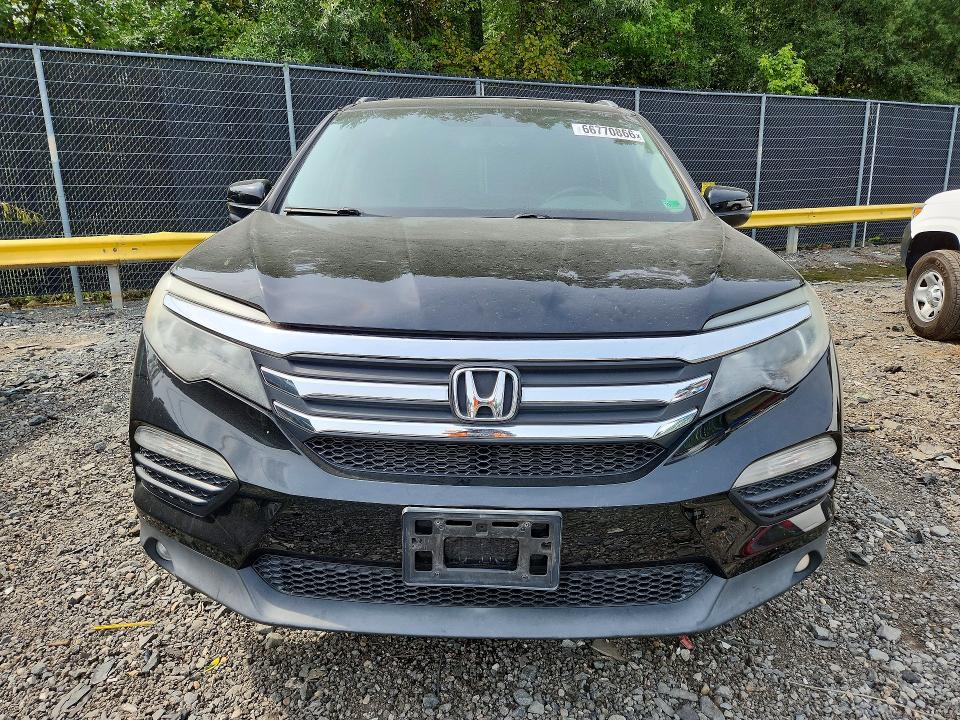 Photo 5 from auction – 2016 HONDA PILOT with VIN 5FNYF6H55GB085708