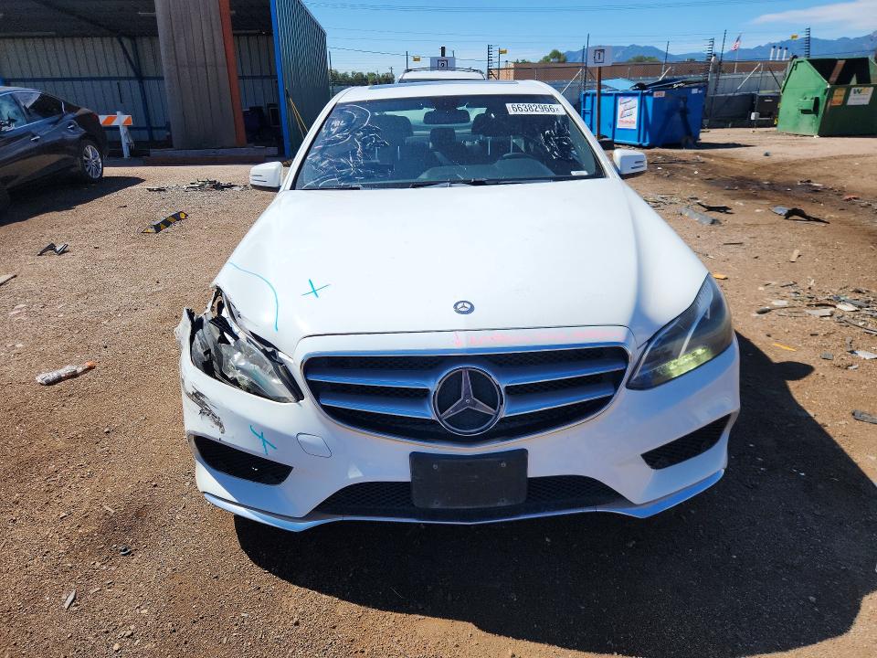 Photo 5 from auction – 2014 MERCEDES-BENZ E with VIN WDDHF5KB3EB058568