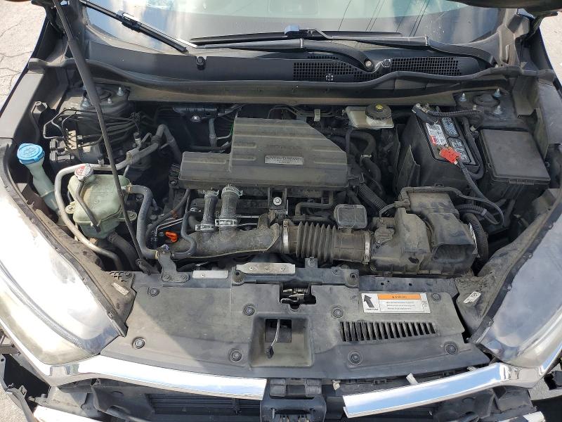 Photo 12 from auction – 2018 HONDA CR-V with VIN 7FARW2H90JE038209