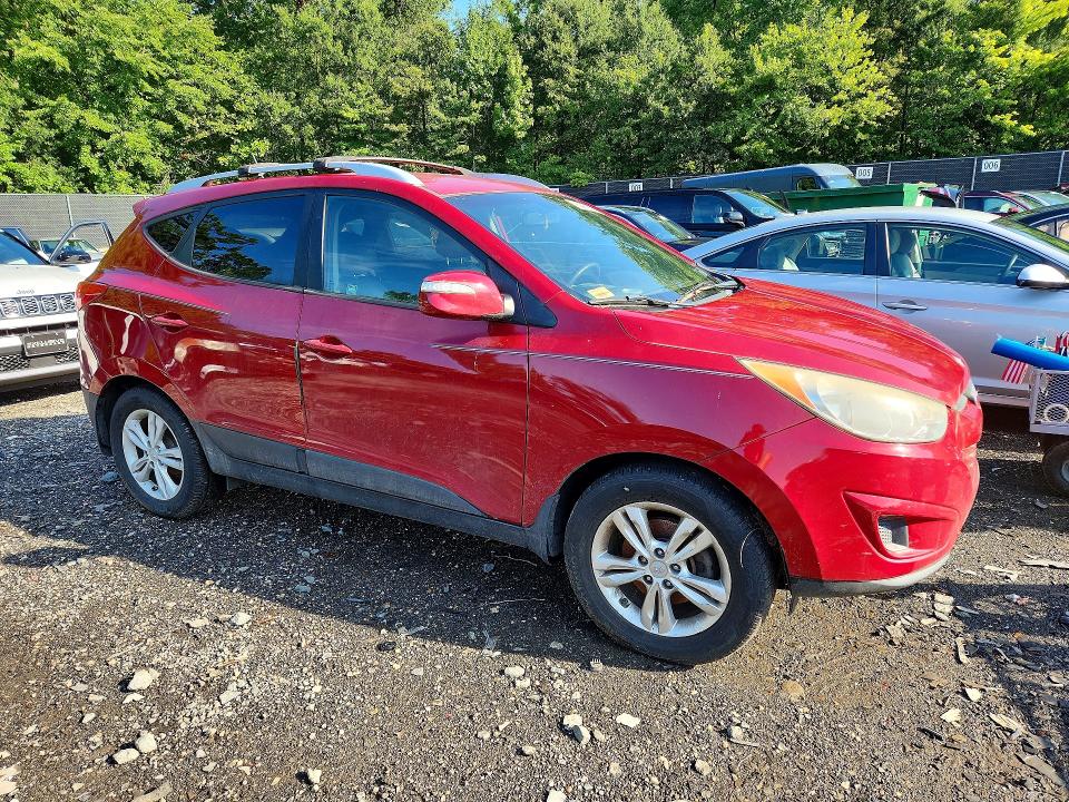 Photo 4 from auction – 2012 HYUNDAI TUCSON with VIN KM8JU3AC5CU513434