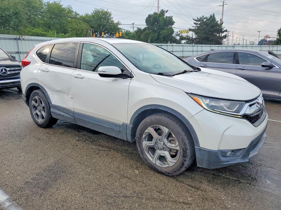 Photo 4 from auction – 2019 HONDA CR-V with VIN 5J6RW1H50KL006646