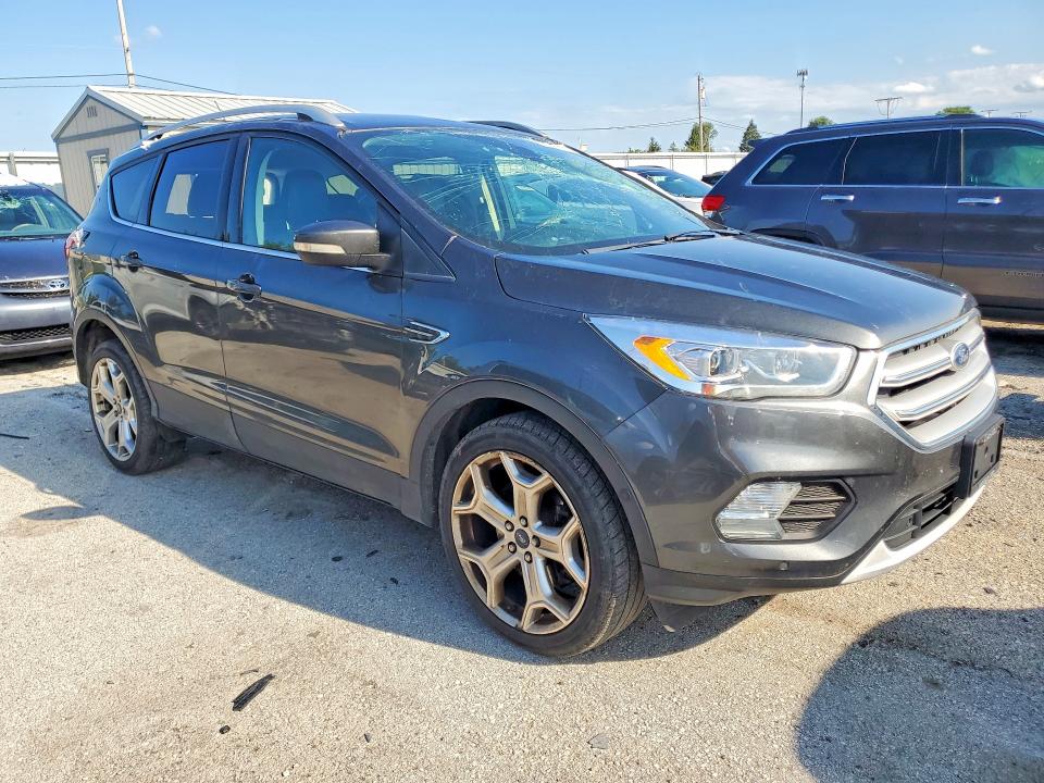 Photo 4 from auction – 2019 FORD ESCAPE with VIN 1FMCU9J98KUC37300