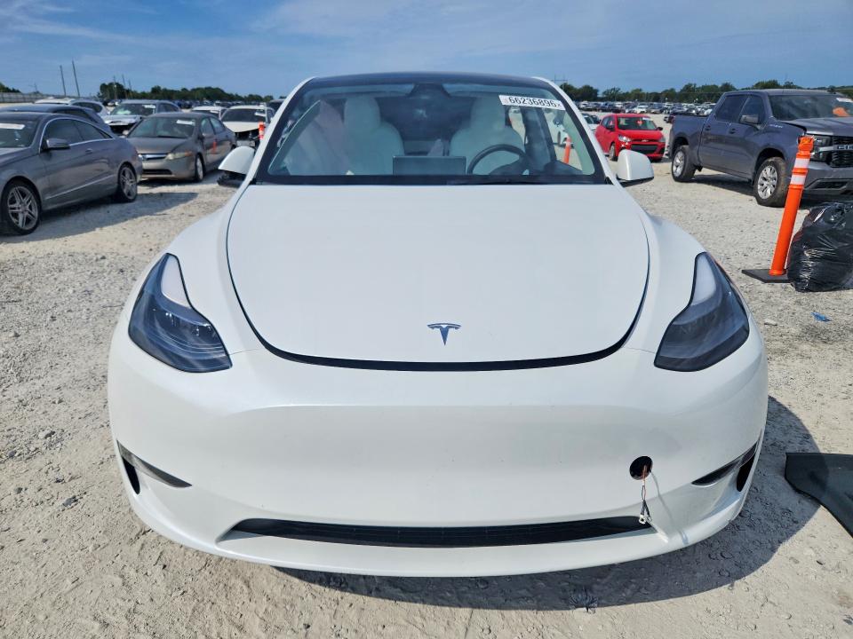 Снимка 5 от търг – 2023 TESLA MODEL Y с VIN 7SAYGAEE6PF807324
