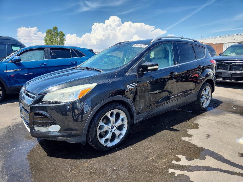 FORD ESCAPE 2014 with VIN 1FMCU0JX5EUD77531 - Photo from auction