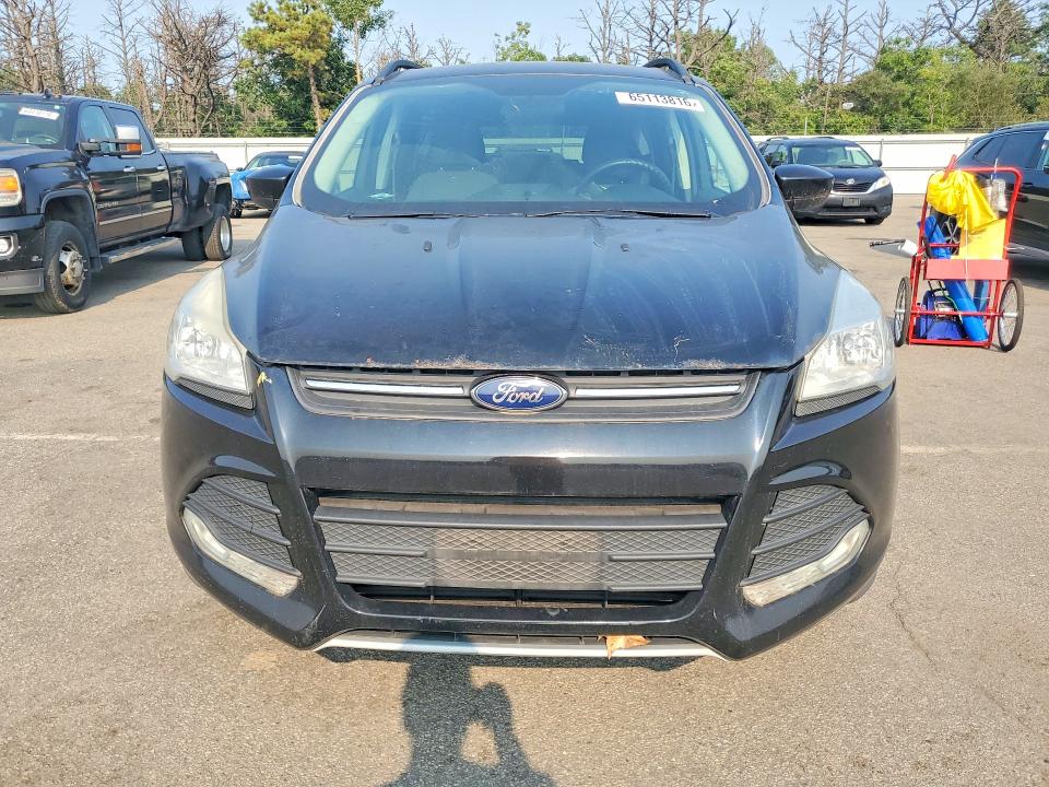 Photo 5 from auction – 2016 FORD ESCAPE with VIN 1FMCU0GX8GUA63981