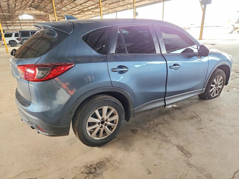 Photo 3 from auction – 2015 MAZDA CX-5 with VIN JM3KE2BE4F0482910